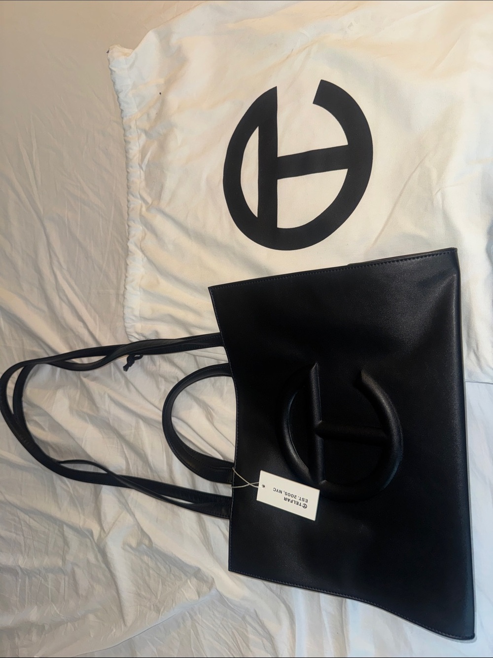 Black Leather Tote Bag with Round Logo Accent
